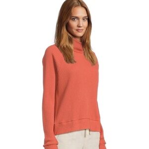 The North Face Chabot waffle knit Women's Vibrant Coral Turtleneck Sweater.